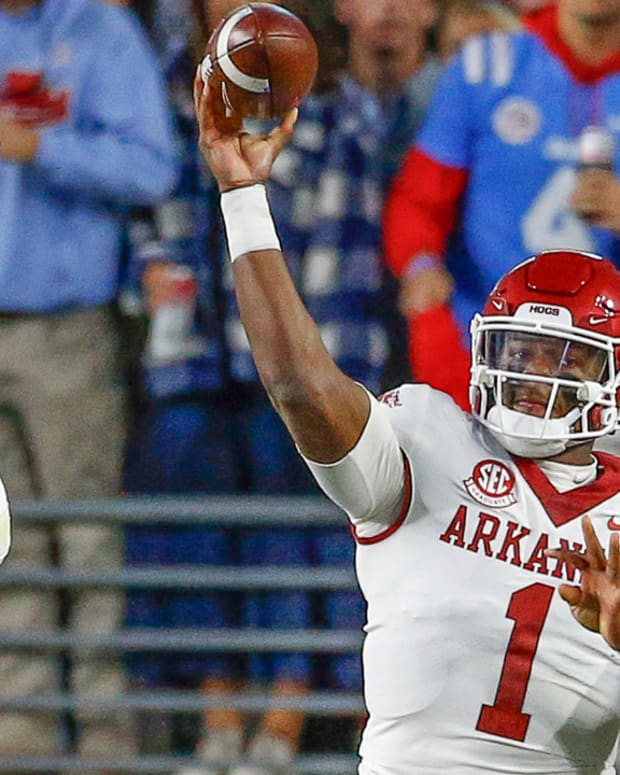 Razorbacks quarterback KJ Jefferson throwing a pass against Ole Miss on Saturday night